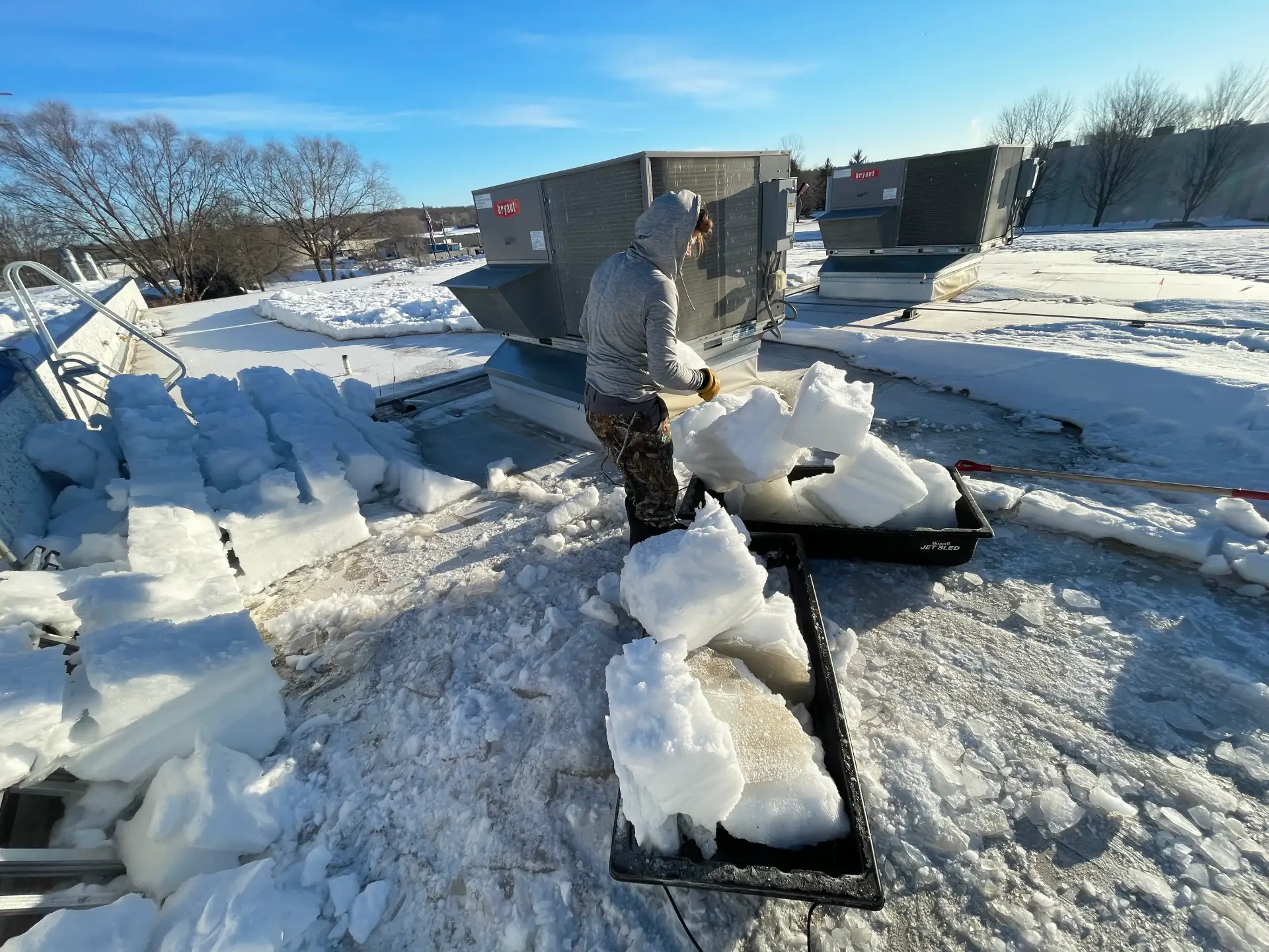 Commercial roof snow removal company